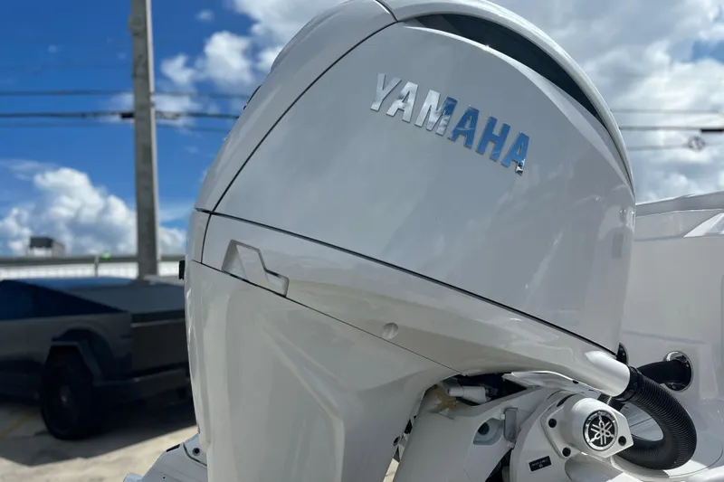  Yacht Photos Pics Yamaha outboard motor on 2026 Sea Fox 268 Commander boat under blue sky.