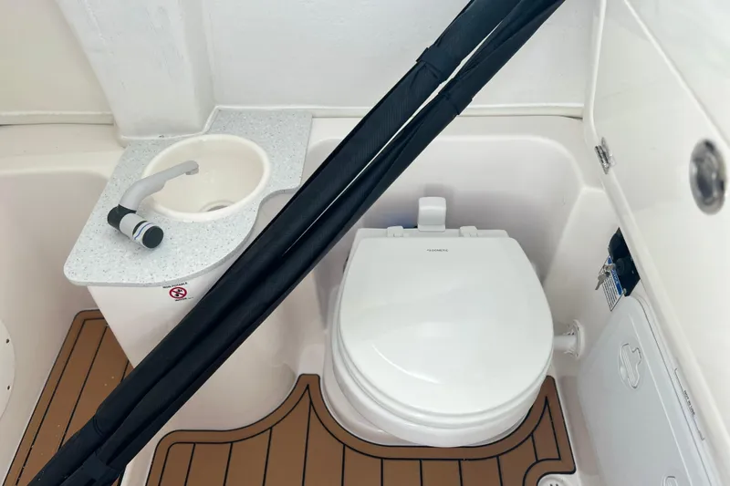 Yacht Photos Pics 2026 Sea Fox 268 Commander boat bathroom with sink and toilet.
