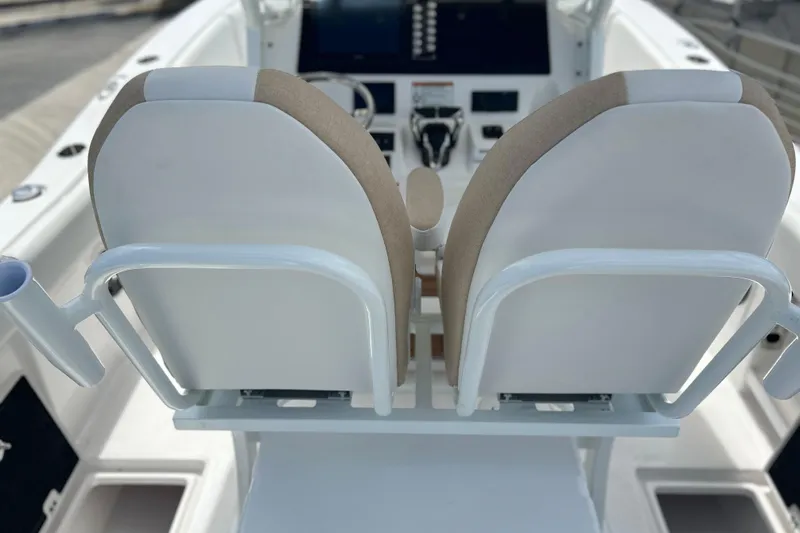  Yacht Photos Pics 2026 Sea Fox 268 Commander boat cockpit with dual seats and control panel.