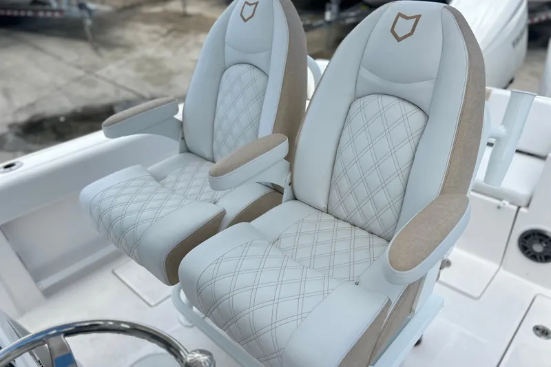  Yacht Photos Pics Luxury seating on 2026 Sea Fox 268 Commander boat, featuring elegant diamond-stitched upholstery.