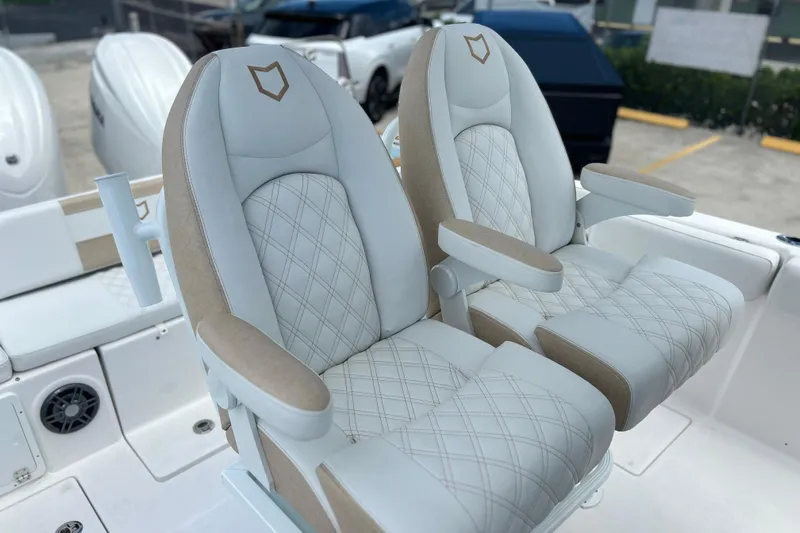  Yacht Photos Pics Luxury seating on 2026 Sea Fox 268 Commander boat, featuring elegant diamond-stitched upholstery.