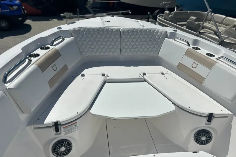  Yacht Photos Pics 2026 Sea Fox 268 Commander boat interior with cushioned seating and cup holders.