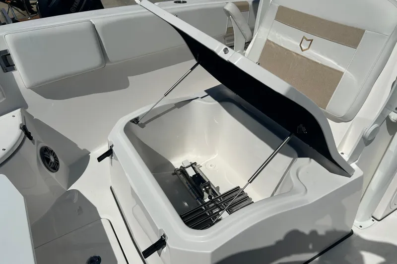  Yacht Photos Pics 2026 Sea Fox 268 Commander boat interior with open storage compartment.