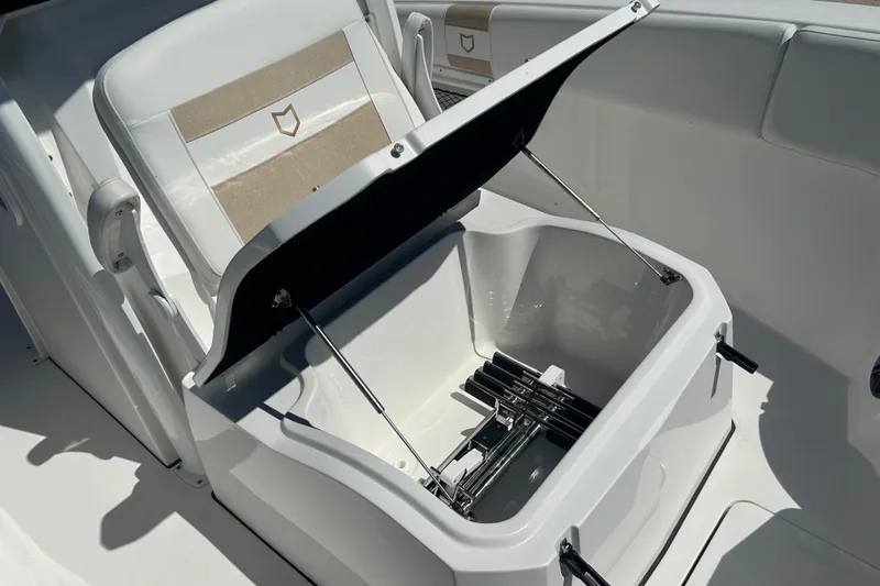  Yacht Photos Pics 2026 Sea Fox 268 Commander boat seat with open storage compartment.