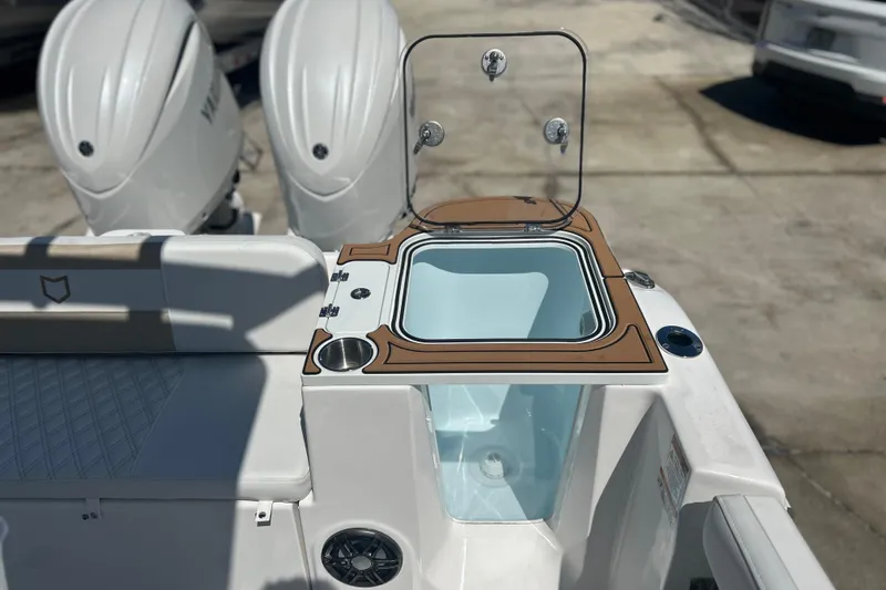  Yacht Photos Pics 2026 Sea Fox 268 Commander boat with open livewell and dual outboard engines.