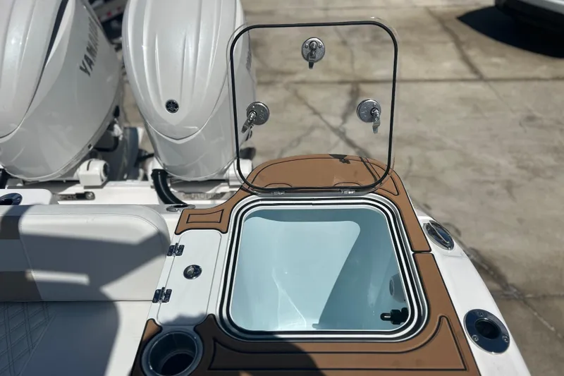  Yacht Photos Pics 2026 Sea Fox 268 Commander boat with open hatch and dual Yamaha engines.