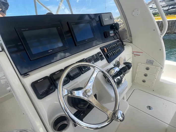  Yacht Photos Pics 2008 Hydra-Sports 3500VX boat helm with modern navigation equipment and controls.