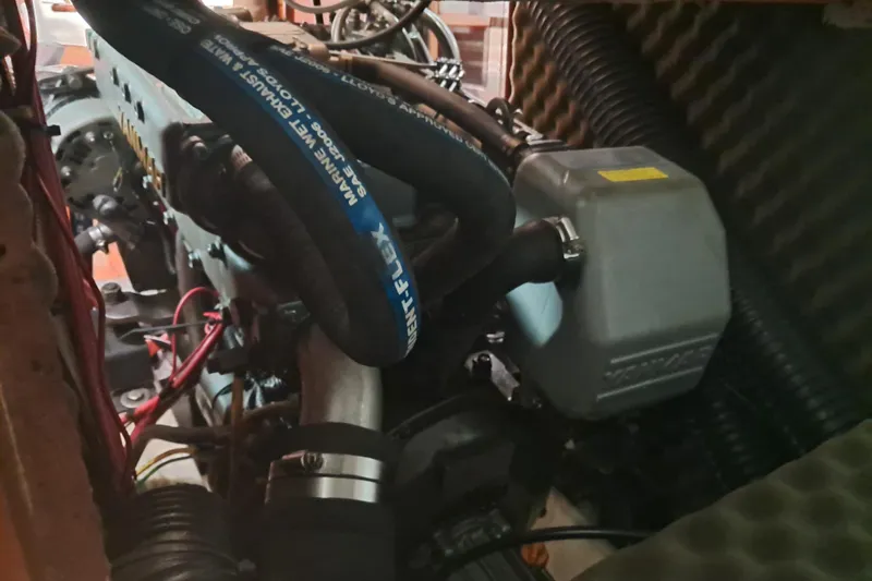 Anyroad Yacht Photos Pics Engine compartment of a 2006 Beneteau 423 sailboat, featuring hoses and wiring.