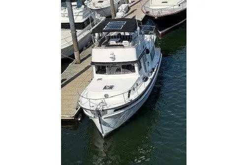 Spray Yacht Photos Pics 2015 Nordic Tug 39 Flybridge docked at marina, aerial view.