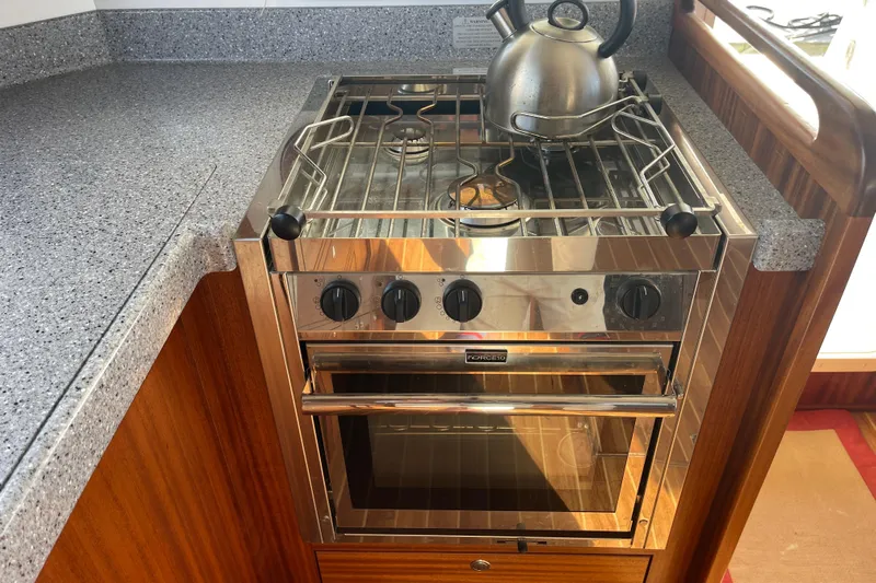 Spray Yacht Photos Pics Stainless steel stove and oven in 2015 Nordic Tug 39 boat kitchen.