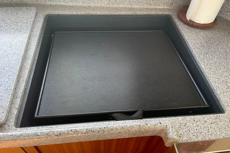 Spray Yacht Photos Pics Built-in stovetop cover on 2015 Nordic Tug 39 yacht kitchen counter.