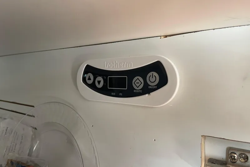 Spray Yacht Photos Pics Control panel inside a 2015 Nordic Tug 39 boat, featuring buttons and display.