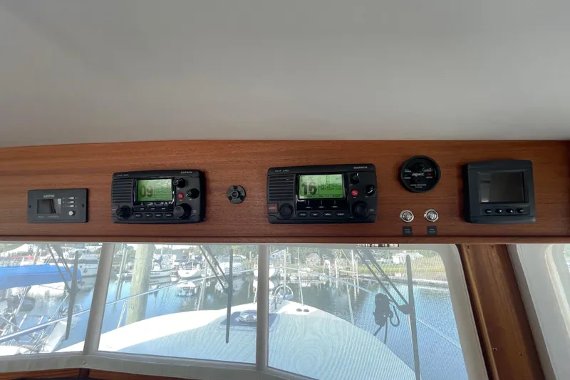 Spray Yacht Photos Pics Control panel of a 2015 Nordic Tug 39 with navigation instruments and gauges.