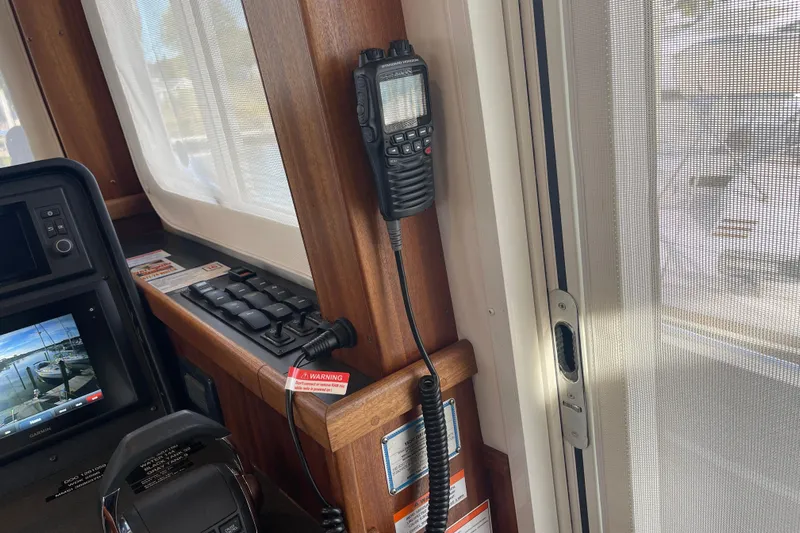 Spray Yacht Photos Pics Interior of 2015 Nordic Tug 39 with radio and control panel.