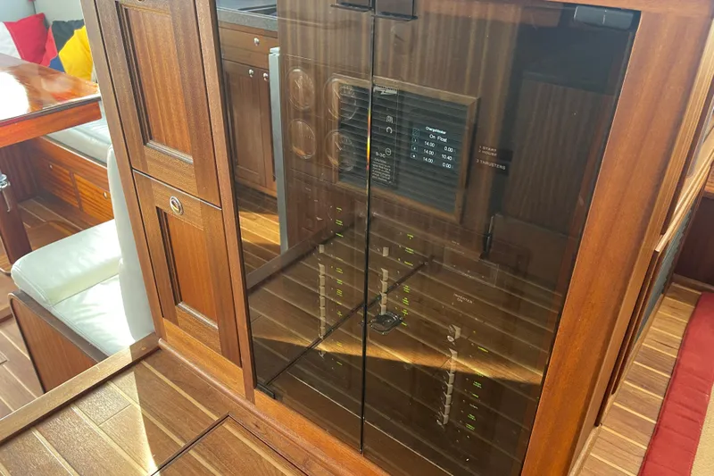Spray Yacht Photos Pics Interior of 2015 Nordic Tug 39 with wooden cabinetry and control panel.