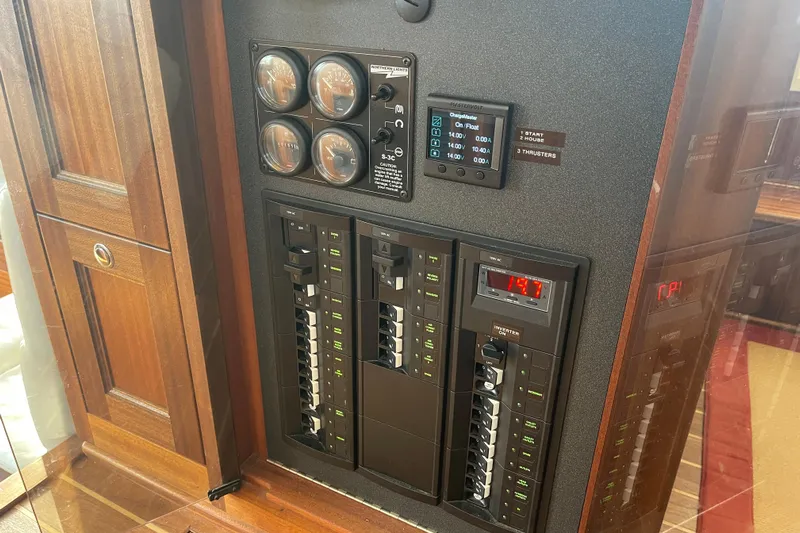 Spray Yacht Photos Pics Electrical control panel on a 2015 Nordic Tug 39 boat, featuring gauges and switches.