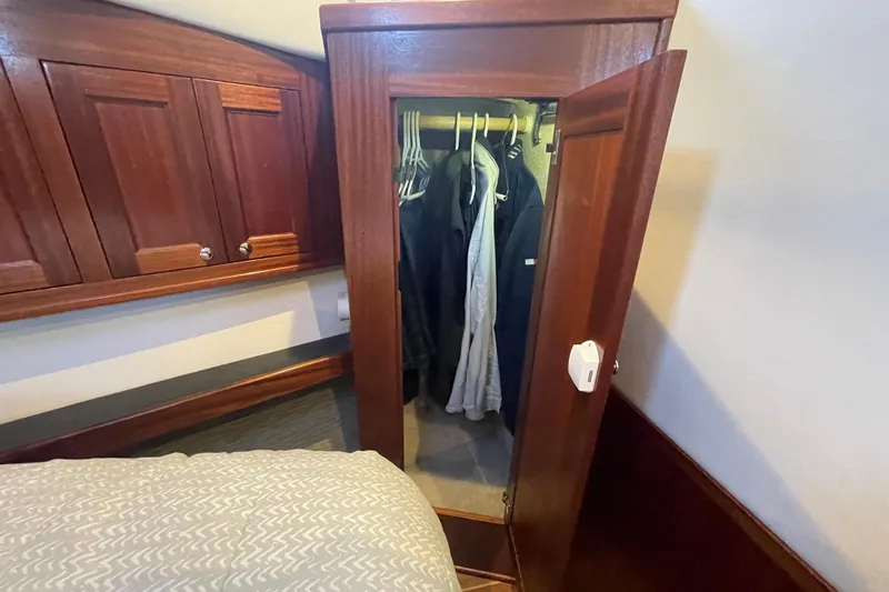 Spray Yacht Photos Pics Wooden wardrobe and cabinets in 2015 Nordic Tug 39 boat interior.