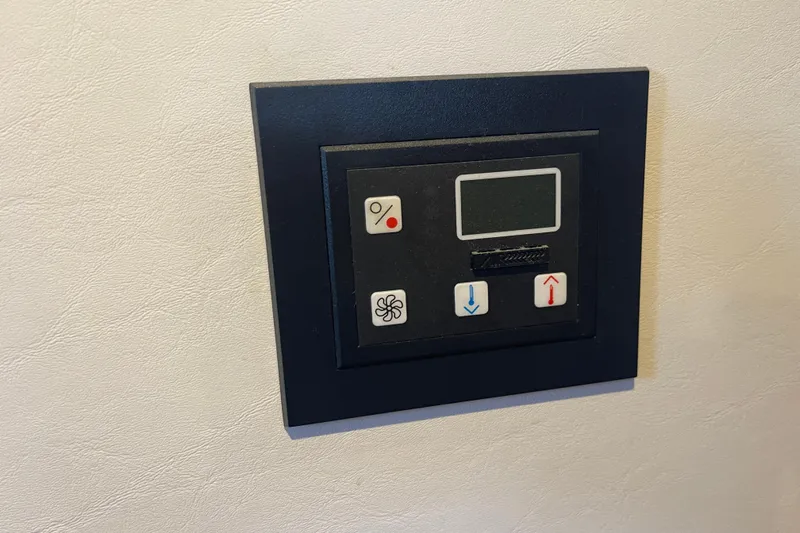 Spray Yacht Photos Pics Control panel on a 2015 Nordic Tug 39 boat, featuring temperature and fan settings.