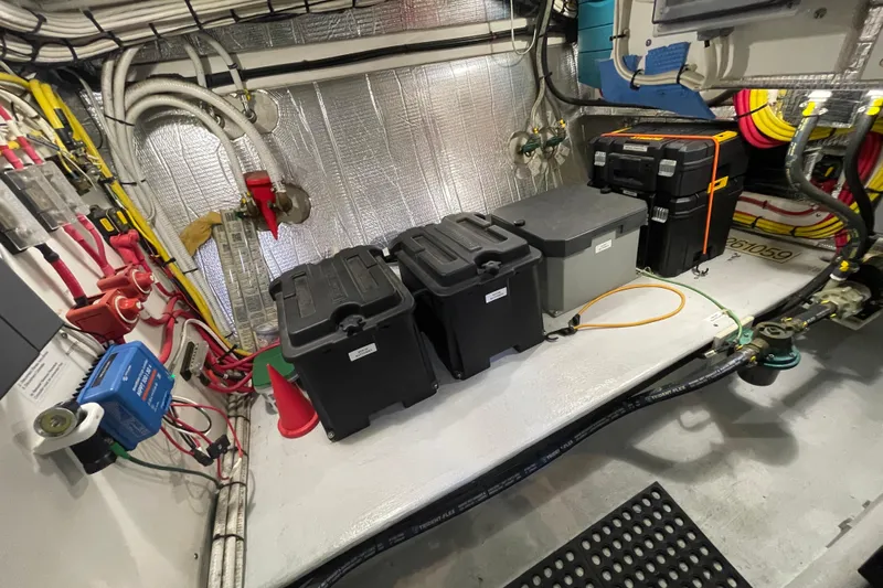 Spray Yacht Photos Pics Engine room of a 2015 Nordic Tug 39 with organized wiring and equipment.