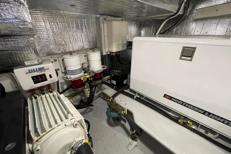 Spray Yacht Photos Pics Engine room of 2015 Nordic Tug 39 with Northern Lights generator and U-Lube system.