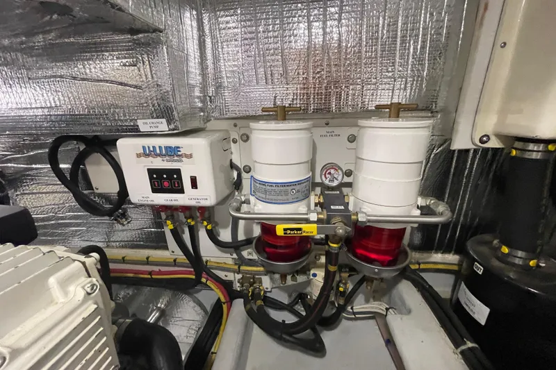 Spray Yacht Photos Pics Engine room of 2015 Nordic Tug 39 with fuel filters and oil change pump.