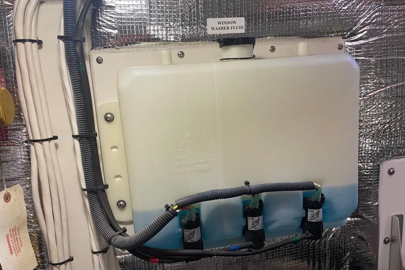 Spray Yacht Photos Pics Window washer fluid tank in a 2015 Nordic Tug 39 boat engine room.