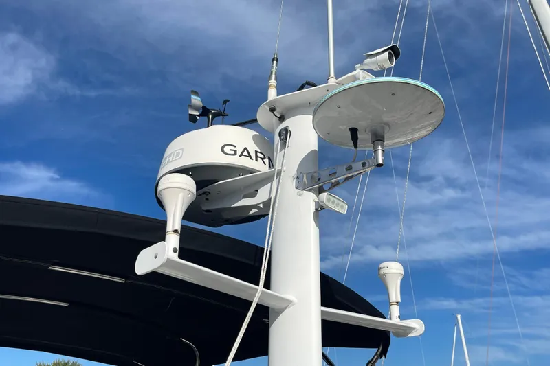 Spray Yacht Photos Pics Nordic Tug 39 (2015) with Garmin radar and equipment against blue sky.