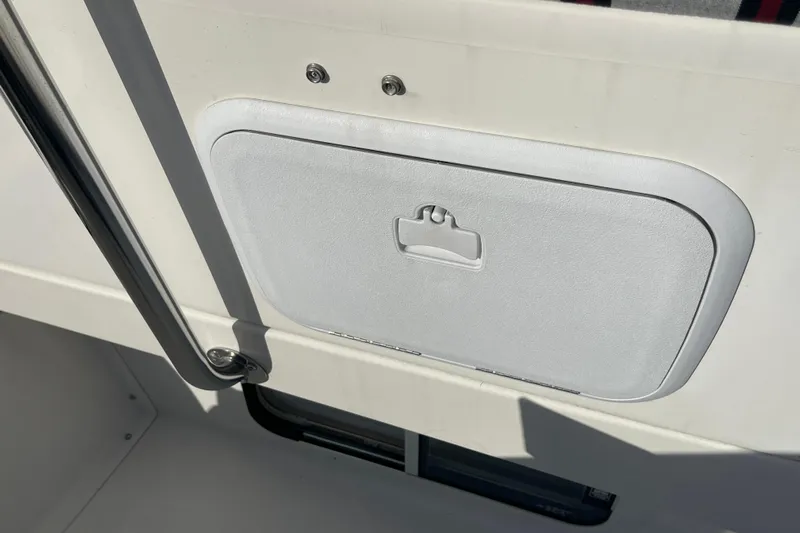 Spray Yacht Photos Pics Access hatch on 2015 Nordic Tug 39 boat, featuring a sleek white design.