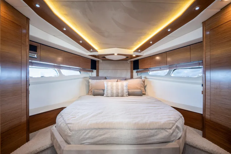 Chassan Yacht Photos Pics Luxurious 2016 Cruisers Cantius yacht bedroom with modern wood paneling and ambient lighting.