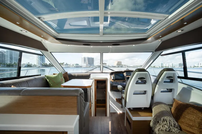 Chassan Yacht Photos Pics Luxurious 2016 Cruisers Cantius yacht interior with panoramic windows and modern seating.