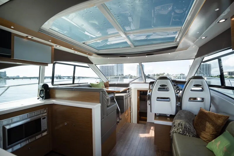 Chassan Yacht Photos Pics Luxurious 2016 Cruisers Cantius yacht interior with panoramic windows and modern amenities.