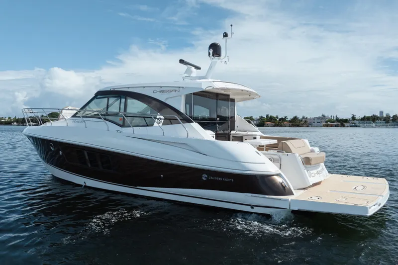 Chassan Yacht Photos Pics 2016 Cruisers Cantius yacht on calm water, showcasing sleek design and luxury features.