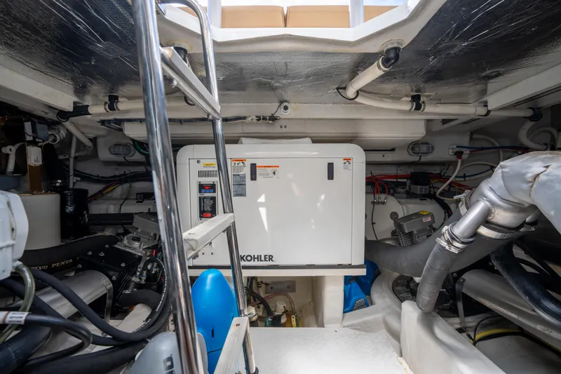 Chassan Yacht Photos Pics Engine room of 2016 Cruisers Cantius yacht with Kohler generator and Volvo Penta components.