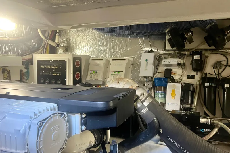 Chassan Yacht Photos Pics Engine room of 2016 Cruisers Yachts 45 Cantius with mechanical and electrical systems.