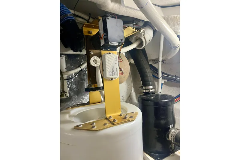 Chassan Yacht Photos Pics Engine room of 2016 Cruisers Yachts 45 Cantius with mechanical components and piping.