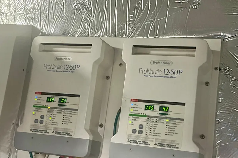 Chassan Yacht Photos Pics ProMariner ProNautic 12:50P chargers on 2016 Cruisers Yachts 45 Cantius, displaying voltage and current.