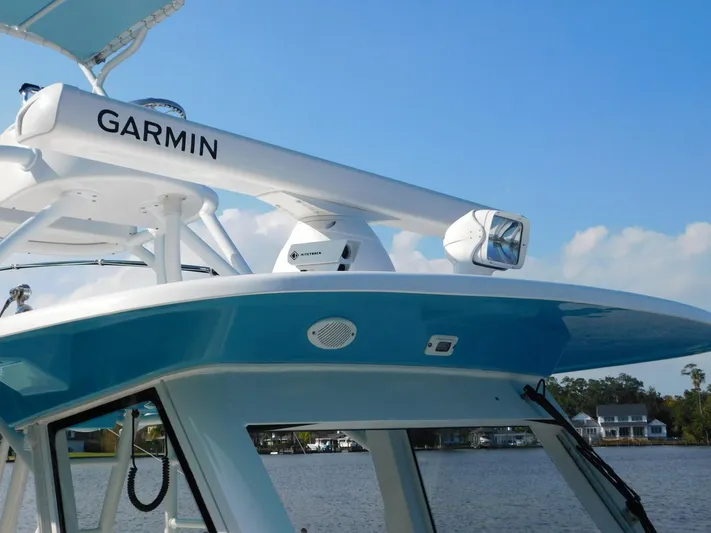  Yacht Photos Pics 2016 Everglades 355 Center Console boat with Garmin equipment on a sunny day.