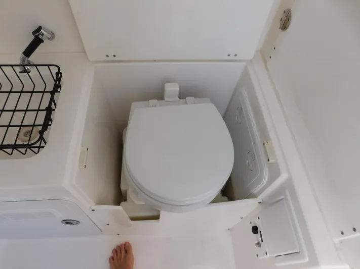  Yacht Photos Pics Compact marine toilet in 2016 Everglades 355 Center Console boat.