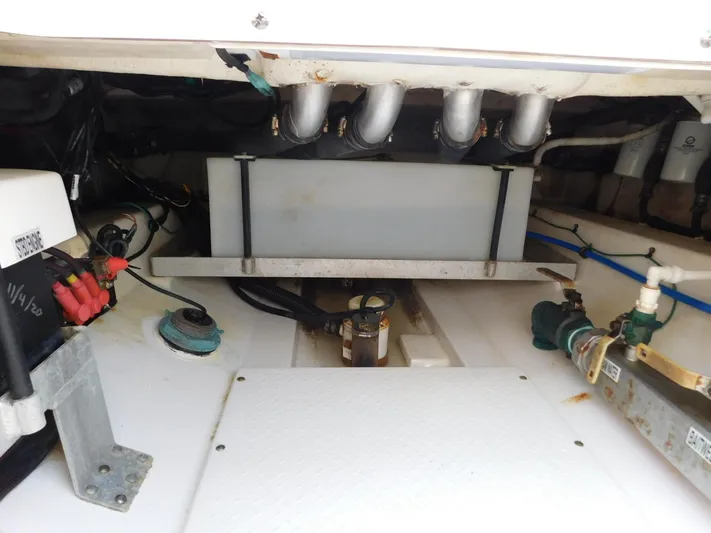  Yacht Photos Pics Engine compartment of a 2016 Everglades 355 Center Console boat, showing mechanical components.