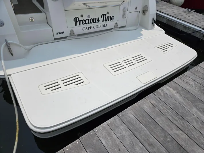 Precious Time Yacht Photos Pics 2017 Sea Ray Sundancer 400 yacht docked, featuring a spacious swim platform.