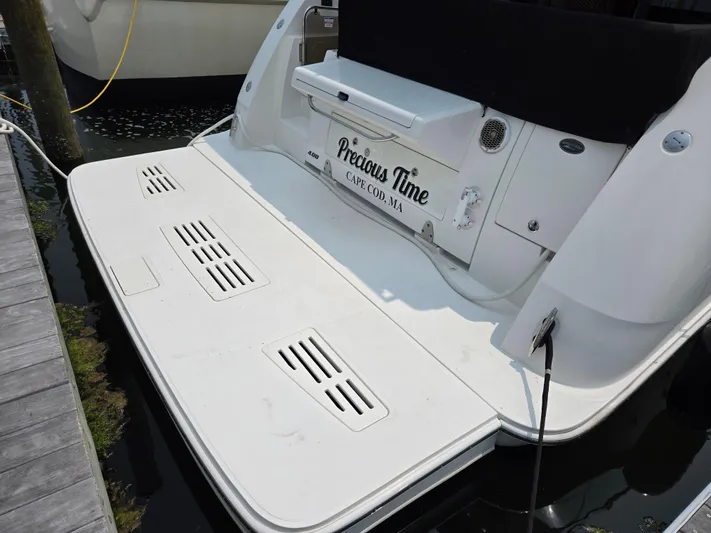 Precious Time Yacht Photos Pics 2017 Sea Ray Sundancer 400 yacht stern with swim platform and "Precious Time" name.