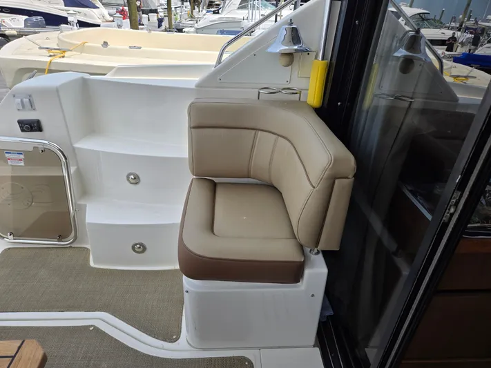Precious Time Yacht Photos Pics 2017 Sea Ray Sundancer 400 boat interior with beige seating and steps.