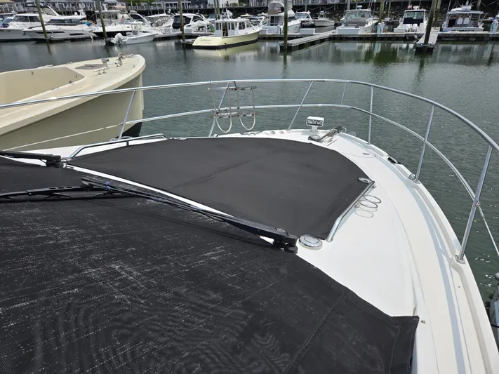 Precious Time Yacht Photos Pics 2017 Sea Ray Sundancer 400 yacht docked at marina, featuring sleek bow design.