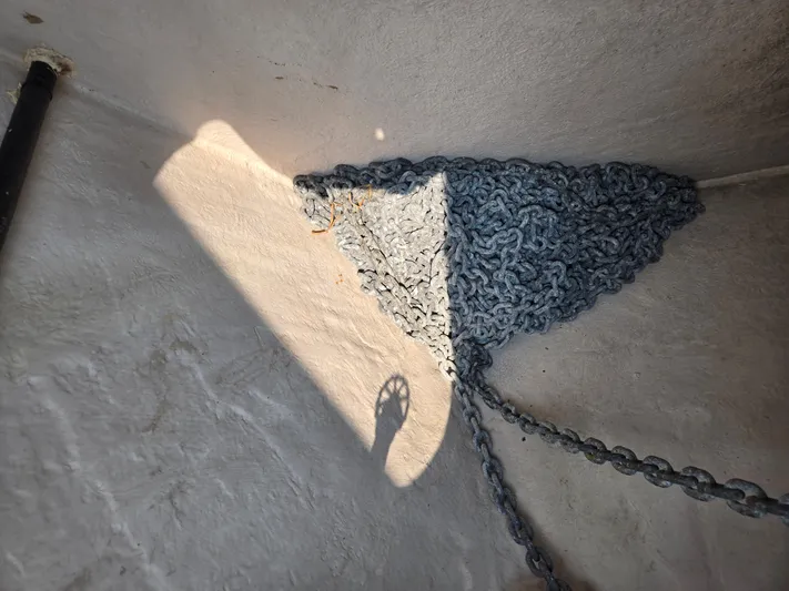 Precious Time Yacht Photos Pics Anchor chain in a Sea Ray Sundancer 400, 2017 model, stored in a compartment.