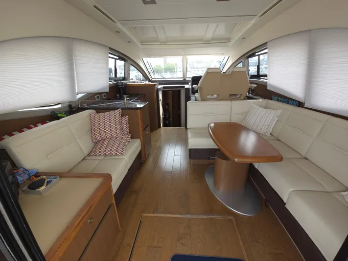 Precious Time Yacht Photos Pics Interior of 2017 Sea Ray Sundancer 400 yacht with elegant seating and dining area.