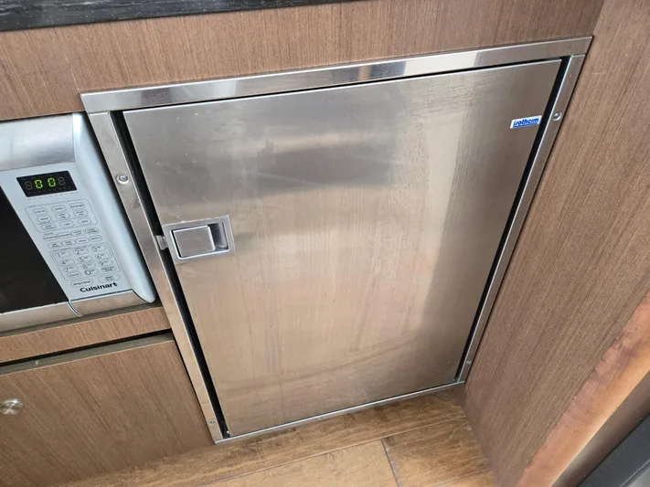 Precious Time Yacht Photos Pics Stainless steel fridge in 2017 Sea Ray Sundancer 400 yacht kitchen.