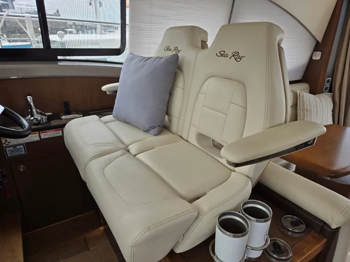 Precious Time Yacht Photos Pics Luxurious 2017 Sea Ray Sundancer 400 interior with plush seating and cup holders.