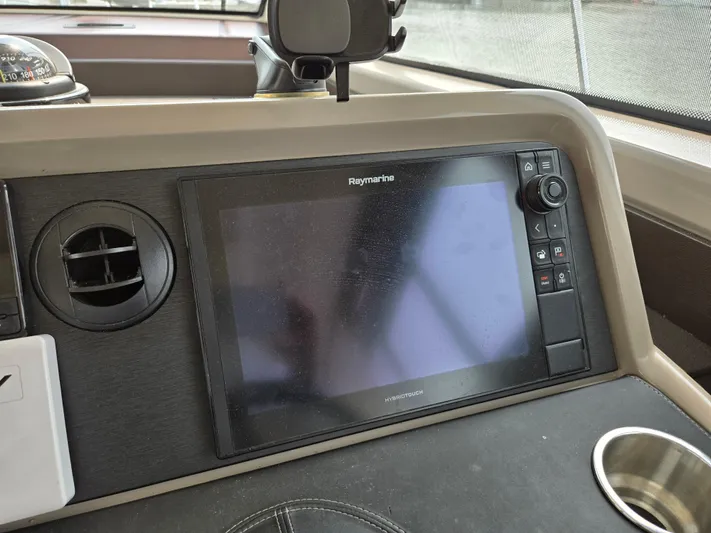 Precious Time Yacht Photos Pics Raymarine navigation system on 2017 Sea Ray Sundancer 400 yacht dashboard.