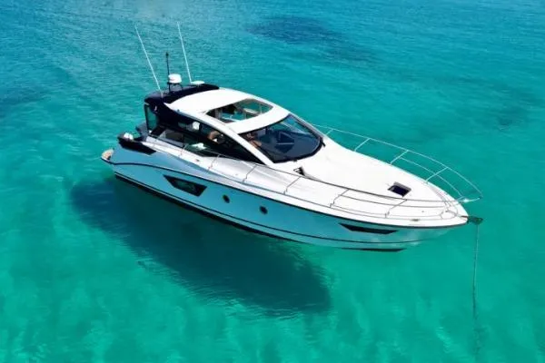 Sol Y Luna Yacht Photos Pics 2018 Beneteau 46 yacht on clear turquoise water.