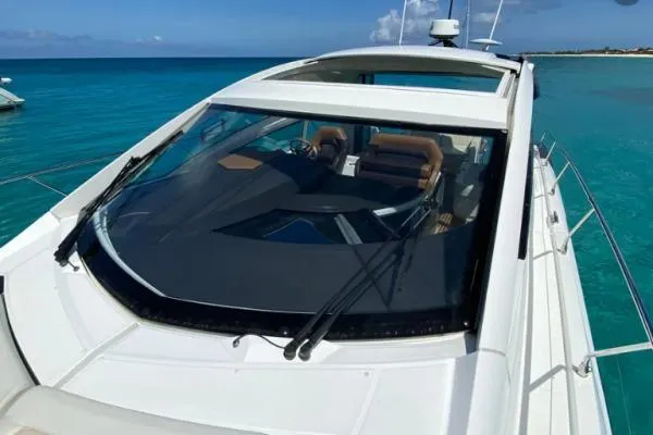 Sol Y Luna Yacht Photos Pics 2018 Beneteau 46 yacht on clear blue water, showcasing sleek design and spacious deck.